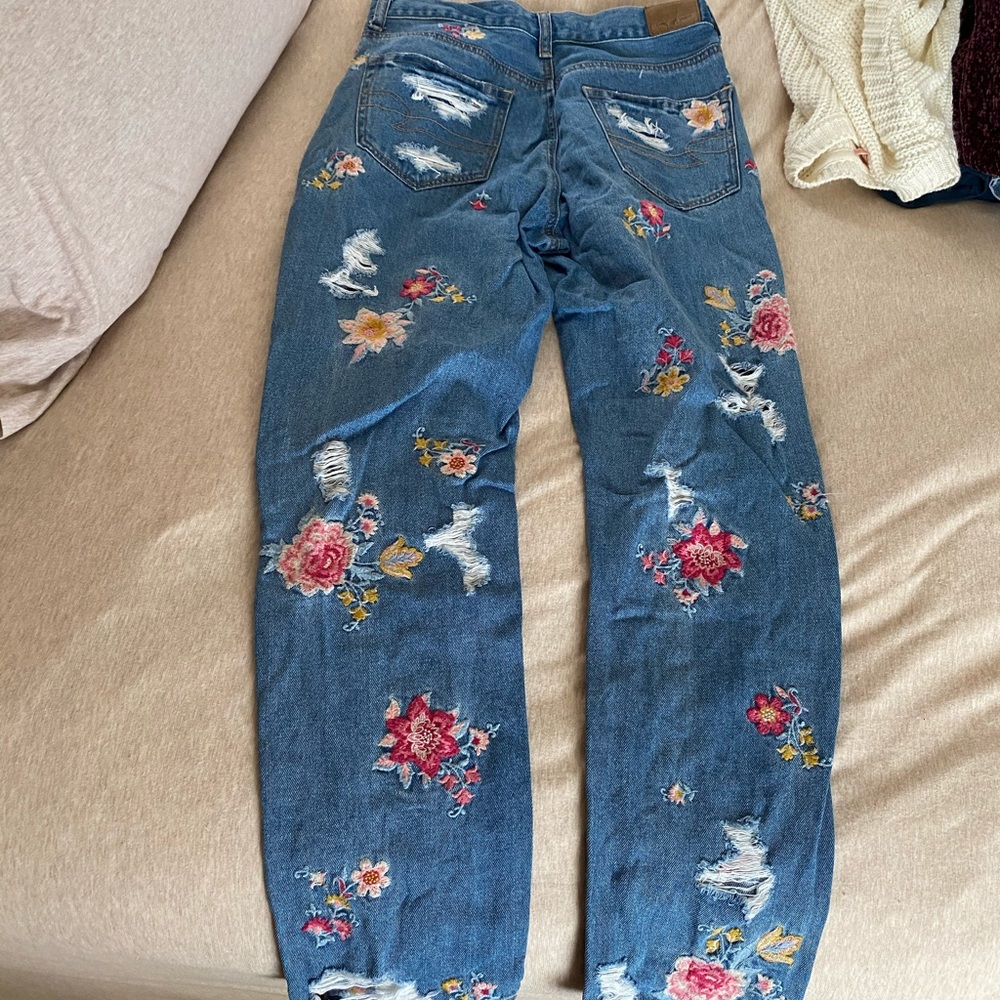 Pink and yellow flower embroidered jeans
